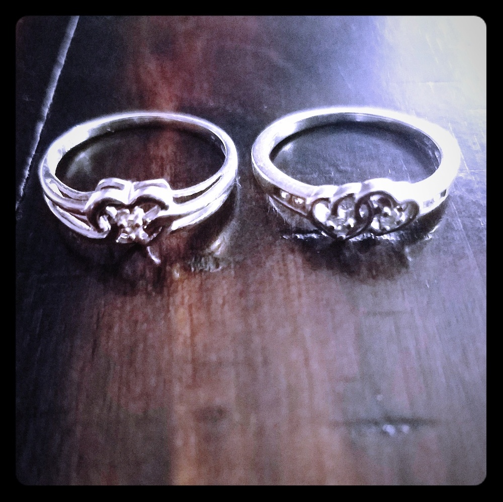 Two 10k solid white gold heart rings.